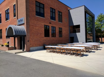 Corporate Retirement Party Outside at Business Office - Wooden Chairs, Rectangular Tables with White Plastic Table Covers (Quick 'Kwik' Covers).