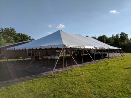 Community Festival - 40' x 80' Tent, Wooden Chairs, Rectangular Tables, Orange Stake Covers.