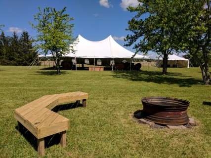 Wedding at Campground - 40' x 60' Tent, 20' x 20' Catering Tent, Wooden Chairs, Rectangular and Round Tables, Cathedral and Solid Sidewalls.