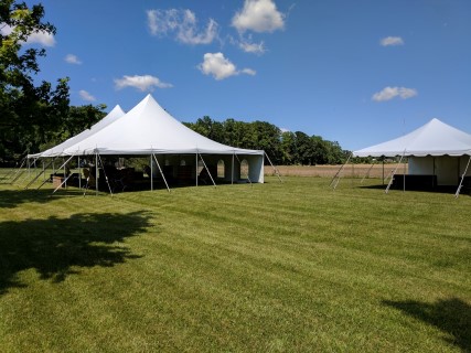 Wedding at Campground - 40' x 60' Tent, 20' x 20' Catering Tent, Wooden Chairs, Rectangular and Round Tables, Cathedral and Solid Sidewalls.