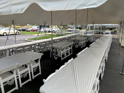 Corporate Event Family Dinner at Senior Living Facility - Three 20' x 40' Tents on Parking Lot and Sidewalk, White Padded Chairs, Rectangular Tables with White Plastic Table Covers (Quick 'Kwik' Covers).