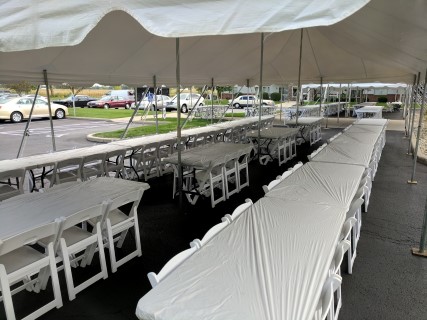 20' x 40' Pole Tent, White Padded Chairs, 8' Banquet Tables with White Plastic Table Covers ('Kwik' Covers).